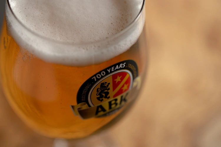Top view of A german munique glass filled with ABK beer